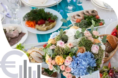 Gráfico de precios de mesa con ramo de flores en catering económico en Guipúzcoa